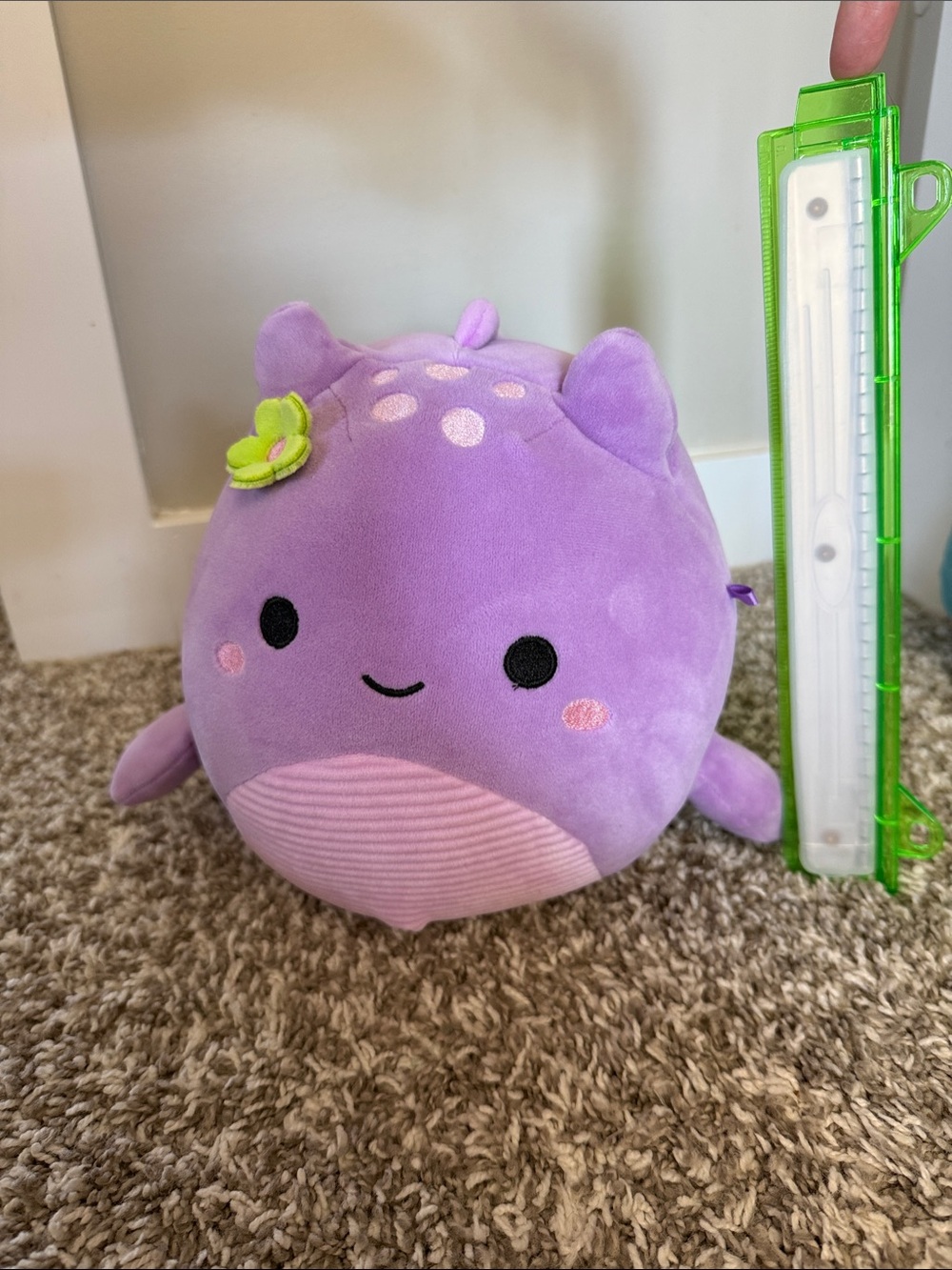 Squishmallows Purple Sea Creature Plush with Green Flower Accent